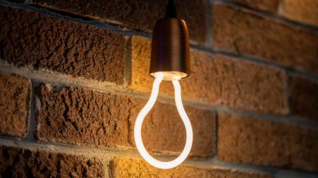 LED Elegance Against Brick Wall wallpaper