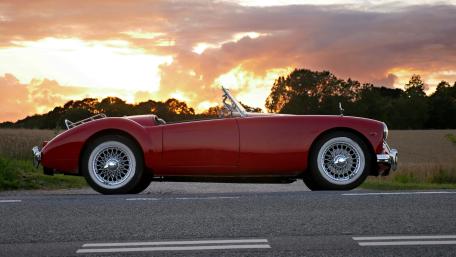 Vintage Convertible at Sunset: Classic Elegance in 4K wallpaper
