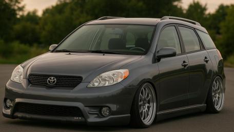 Gray Toyota Matrix on a Scenic Drive wallpaper