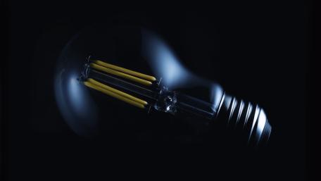Incandescent Glow Against Darkness wallpaper