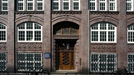 Historic Brick Building in Urban Setting wallpaper