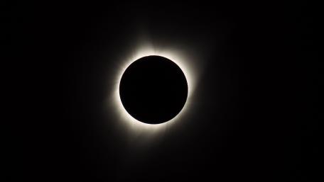 Ethereal Eclipse: Celestial Dance in Darkness wallpaper
