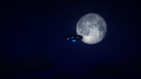 UFO Silhouette Against a Full Moon wallpaper