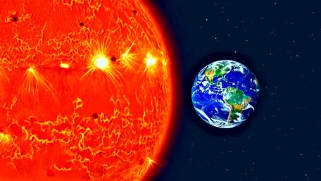 Earth and Sun in Cosmic Dance wallpaper