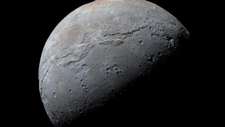 Pluto's Mysterious Moon Charon in 4K Detail wallpaper
