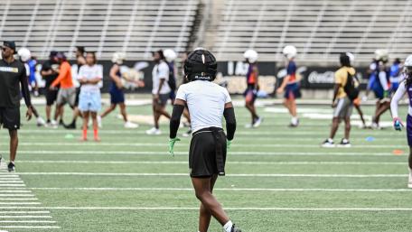 Energetic Football Practice Session in Action wallpaper