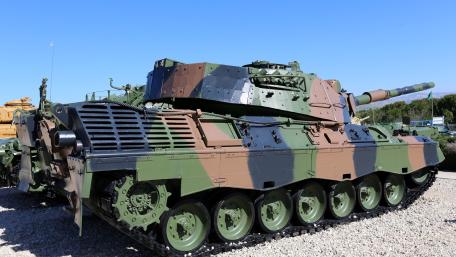 Tank in Camouflage with Military Precision wallpaper