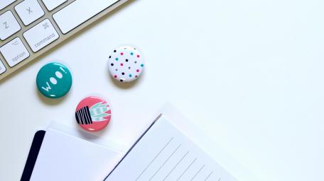 Abstract Desk Composition with Buttons and Notebook wallpaper