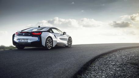 Exhilarating Elegance in Motion: BMW i8 on Open Road wallpaper