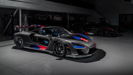 McLaren Senna in a Sleek Showroom Setting wallpaper