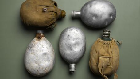 Military Vintage Canteens Displayed in Detailed 8k Quality wallpaper