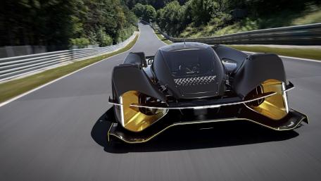 Futuristic Supercar Unleashed on Iconic Le Mans Track wallpaper