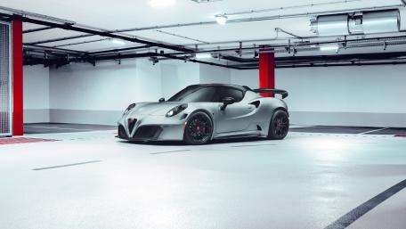 Alfa Romeo 4C in Pristine Garage Setting wallpaper