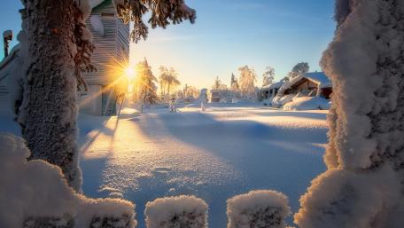 Winter Sunrise Over Snowy Village wallpaper
