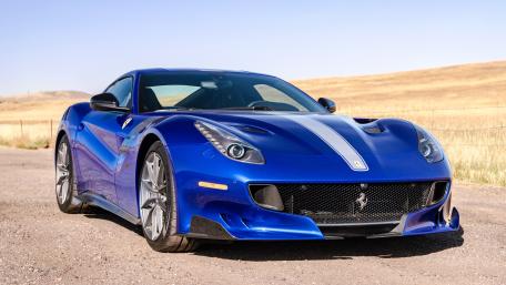 Ferrari in Vivid Blue Elegance wallpaper