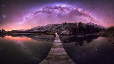 Milky Way Over Tranquil Lakeside Pier wallpaper