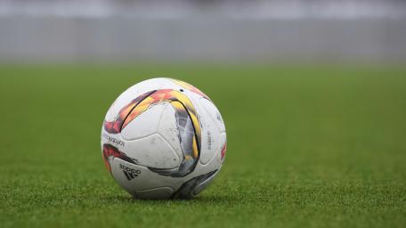 White and gray Adidas soccer ball on lawn grass wallpaper