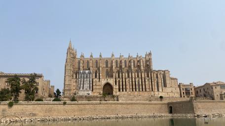 Majestic Cathedral Reflection in the Cityscape wallpaper