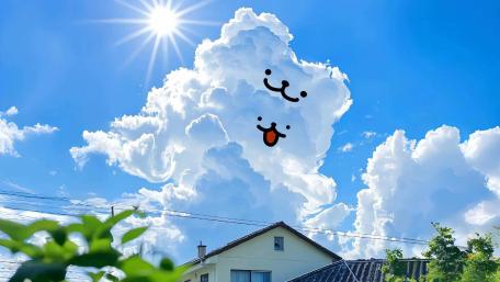 Playful Cloud Faces in Sunny Skies wallpaper