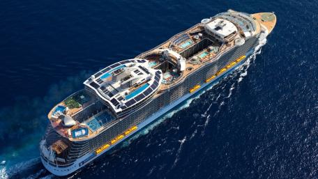 Cruise Ship Gliding Through Blue Waters wallpaper