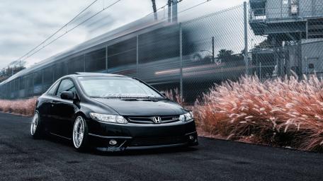 JDM Elegance Honda Civic Against Urban Backdrop wallpaper