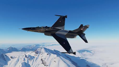 Jet Fighter Ascend Over Snowy Peaks wallpaper