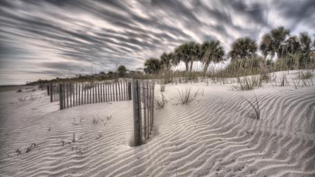 Sand Dunes Under Dramatic Skies wallpaper