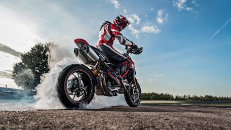 High-Speed Motorcycle Drift on Asphalt wallpaper