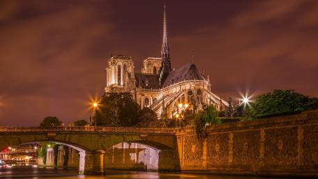 Notre Dame Cathedral Illuminated at Night wallpaper