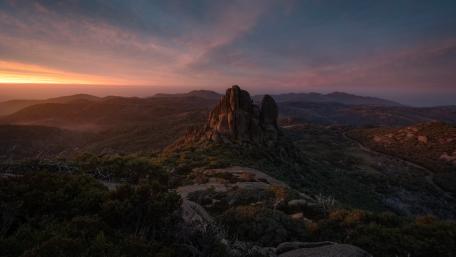 Majestic Sunset over Rocky Outcrop in 8K wallpaper