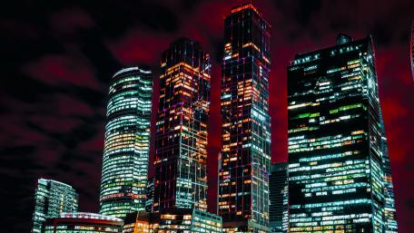 Skyscrapers Illuminated Against a Night Sky wallpaper