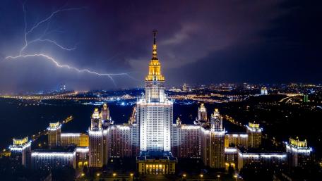 Moscow State University Illuminated by Night Storm wallpaper