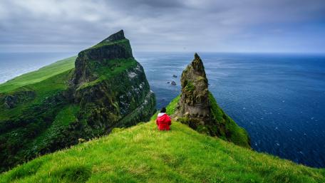 Majestic Cliffs and Tranquil Seas of the Faroe Islands wallpaper
