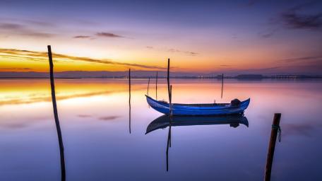 Sunset Serenity on a Tranquil Lake wallpaper