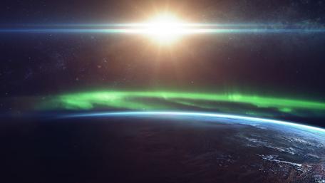 Ethereal Auroras Over Earth's Horizon wallpaper