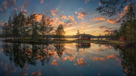Idyllic Red Cottage by Serene Lake in Norway wallpaper