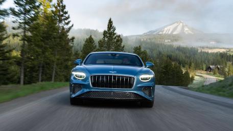 Elegant Power on Scenic Roads wallpaper