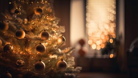Bright Christmas Tree Illumines Festive Spirit with Ornaments wallpaper