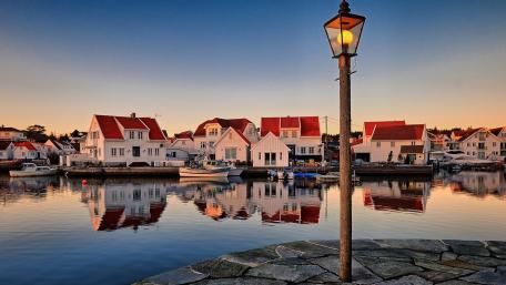 Quaint Waterfront Evening in Skudeneshavn, Norway wallpaper