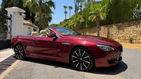 Red BMW Convertible in Sunlit Paradise wallpaper