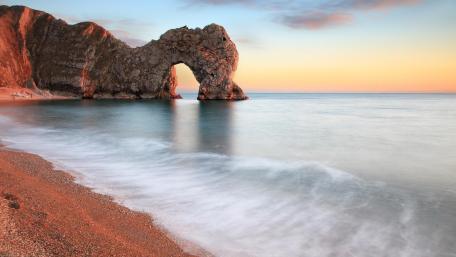 Durdle Door at Sunset on the Jurassic Coast wallpaper