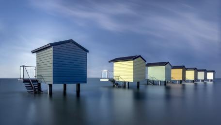 Tranquil Overwater Bungalows at Osea Beach Huts wallpaper