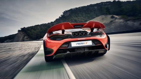 McLaren 765LT Racing on Scenic Mountain Road wallpaper