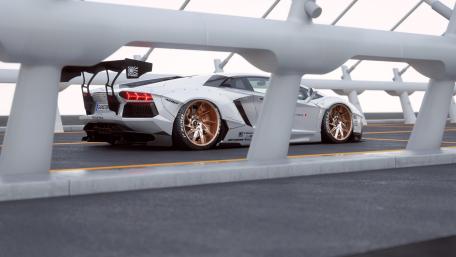 Lamborghini Aventador on Stylish Modern Roadway wallpaper