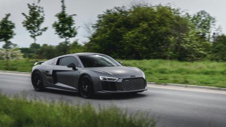 Audi R8 in Motion on Scenic Road wallpaper
