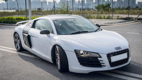 White Audi R8 parked in the middle of the road in Kai Tak, Hong Kong wallpaper