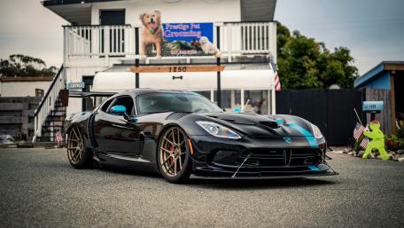 Sleek Supercar in an Urban Setting wallpaper