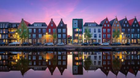 Colorful Canal Houses at Dusk in Vathorst Amersfoort wallpaper