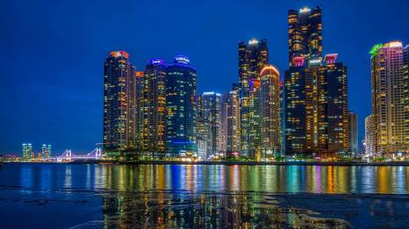 Busan Night Skyline Illuminated in Vibrant Colors wallpaper