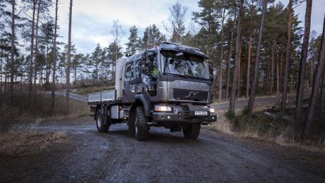 Volvo Truck in Serene Forest Setting wallpaper